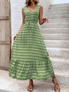 Detail of green and white geometric print sleeveless dress with V-neck and drawstring waist