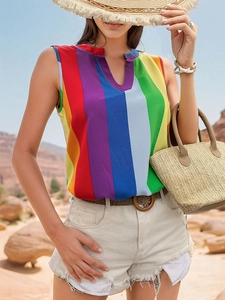 Detailed close-up of vertical rainbow stripes and V-neckline on summer sleeveless top
