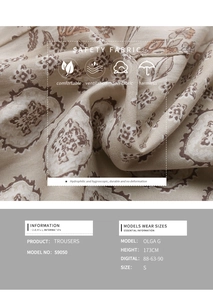 Detail of beige linen fabric with brown paisley floral pattern and breathable texture