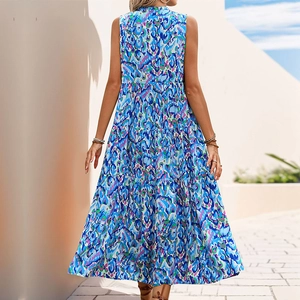 Rear view of sleeveless tiered bohemian maxi dress with blue abstract floral prints