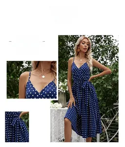 Detail view of blue polka dot dress showing V-neck design and matching waist tie belt
