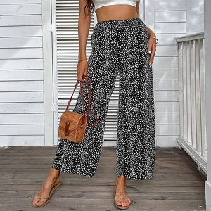Women's high waist wide leg pants with black and white leopard print and elastic waist