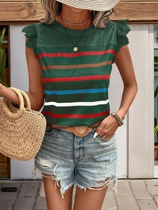 Detail of green summer top with colorful chest stripes and elegant lace butterfly sleeves