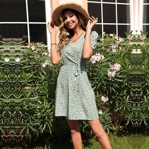 Summer green floral V-neck wrap dress with short sleeves and waist tie detail