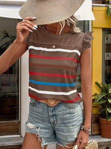 Detail of colorful striped summer top featuring elegant lace trim flutter sleeves