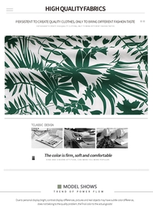 Detail of soft breathable white fabric with green tropical leaf print and sewing quality