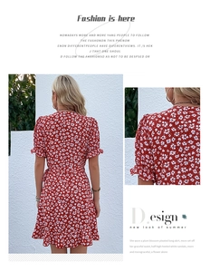 Detail view of red floral wrap dress featuring ruffled sleeves and feminine floral print