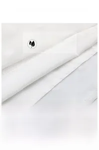 Macro detail of white chiffon fabric with delicate swiss dot texture and breathable finish