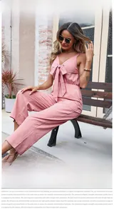 Pink V-neck hollow out jumpsuit with front bow tie and wide leg cotton linen style
