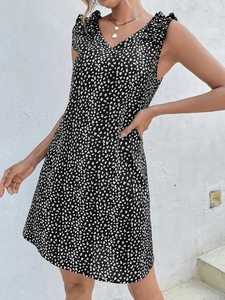 Detail of ruffled butterfly sleeves on a V-neck leopard floral print summer dress