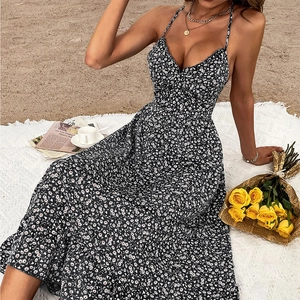 Elegant floral print maxi dress with deep V-neck and spaghetti straps for summer vacations
