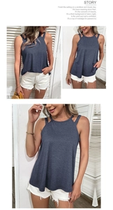 Deep blue cold shoulder halter top with cut-out details and white denim shorts
