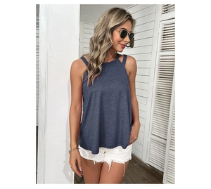 Detail of navy blue cold shoulder top with crisscross straps and casual knit fabric