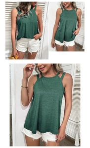Detail of dark green halter top featuring cold-shoulder cutouts and loose summer fit