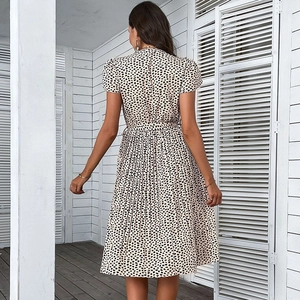 Summer V-neck leopard print pleated dress with waist tie shown from a back view