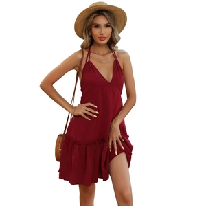Sexy deep V-neck halter dress in dark burgundy with ruffled hem for summer vacations
