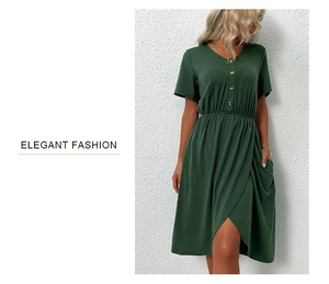 Detail of dark green V-neck dress with buttons, waist tie, and asymmetrical hemline