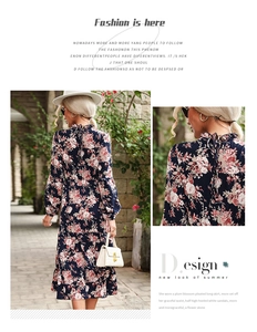 Dettagli dell'abito midi a fiori con fiocco sul retro e orlo a balze stratificato