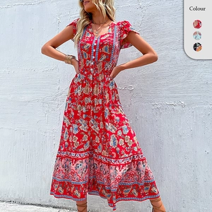 Bohemian V-neck floral maxi dress with ruffle sleeves and smocked waist in red print