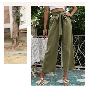 Détail du pantalon large taille haute vert olive avec ceinture à nouer assortie