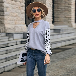 Women's long sleeve leopard print patchwork knit top with hollow V-neck design