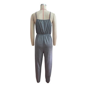 Back view detail of gray casual strapless jumpsuit with elastic waist and cuffed ankles