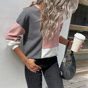 Women's crew neck waffle knit sweater featuring stylish grey pink and white color blocking
