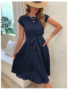 Detail of navy blue sleeveless pleated dress with a round neck and waist tie bow