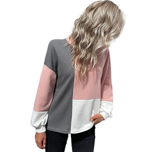 Loose fit waffle knit sweater with color-block panels in grey, pink, and white tones
