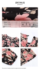 Detail view of floral print fabric, elastic cuffs, and neckline on a black vintage dress