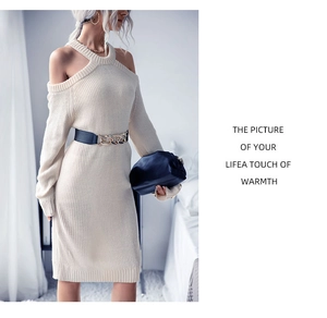 Close-up of ribbed knit fabric texture on an off-shoulder cream halter dress