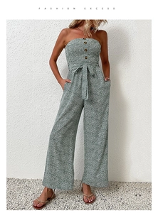 Floral strapless wide leg jumpsuit with waist tie and decorative front buttons detail