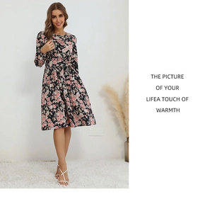 Detailed close-up of French vintage floral print dress with elastic waist and long sleeves
