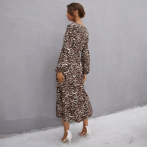 Women's leopard print V-neck maxi dress with long puff sleeves and a belted waist design