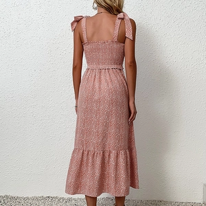 Pink floral off-shoulder summer dress with smocked back and stylish bow shoulder straps