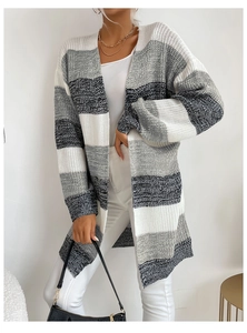 Detailed texture of thick knit fabric on this long striped cardigan for women