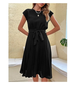 Detail showing the pleated skirt texture and adjustable waist tie of this black summer dress