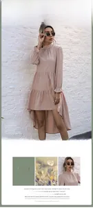 Detail of mauve tiered fishtail dress featuring long lantern sleeves and layered skirt