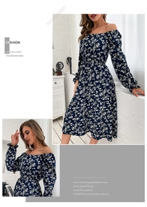 Detail view of navy floral off-shoulder dress with puff sleeves and cinched waist