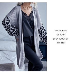 Detail showing grey waffle knit texture and leopard print cuffs on this women cardigan