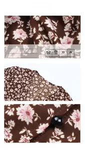 Detail of V-neckline on floral midi dress with a round black button and fine stitching