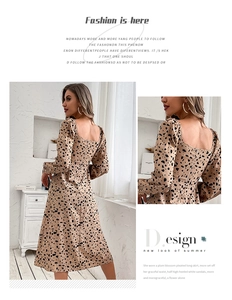 Detail of elegant backless leopard print maxi dress with square neck and long sleeves