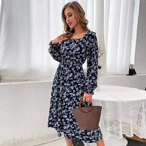French vintage floral midi dress in navy blue with square neck and puff sleeves