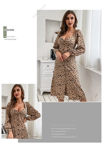 Detail of square neck polka dot midi dress with front knot and button down design