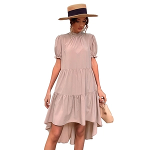 Elegant beige high-waist tiered maxi dress with short puff sleeves and high-low hemline