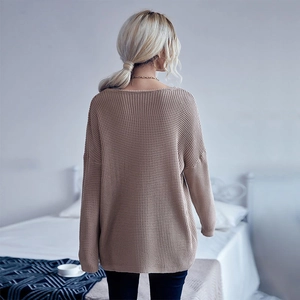 Oversized waffle knit sweater for women in beige featuring a cozy loose fit and round neck