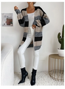 Detail of multi-color thick knit cardigan featuring grey, black and khaki stripe pattern