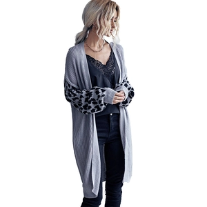 Women's long grey knit cardigan featuring stylish leopard print sleeves in relaxed fit