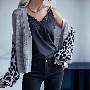Fashionable leopard patchwork grey knit cardigan with a loose fit and modern autumn style