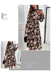 Détails d'une robe midi florale à manches longues avec col montant et lien à la taille